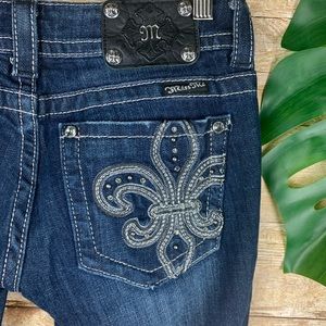 ripped miss me jeans